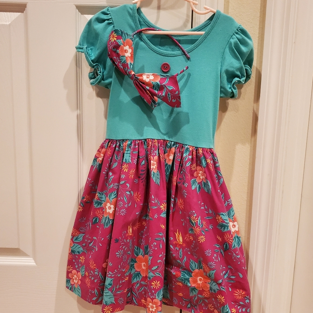 Girls dress with matching headband.